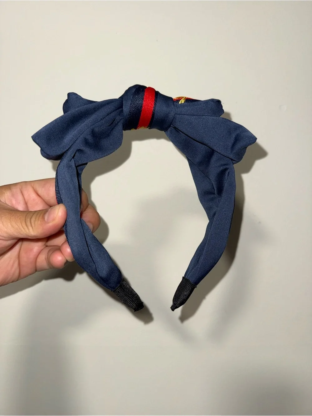 Navy Knotted Silk-Style Headband with Red & Yellow Accents